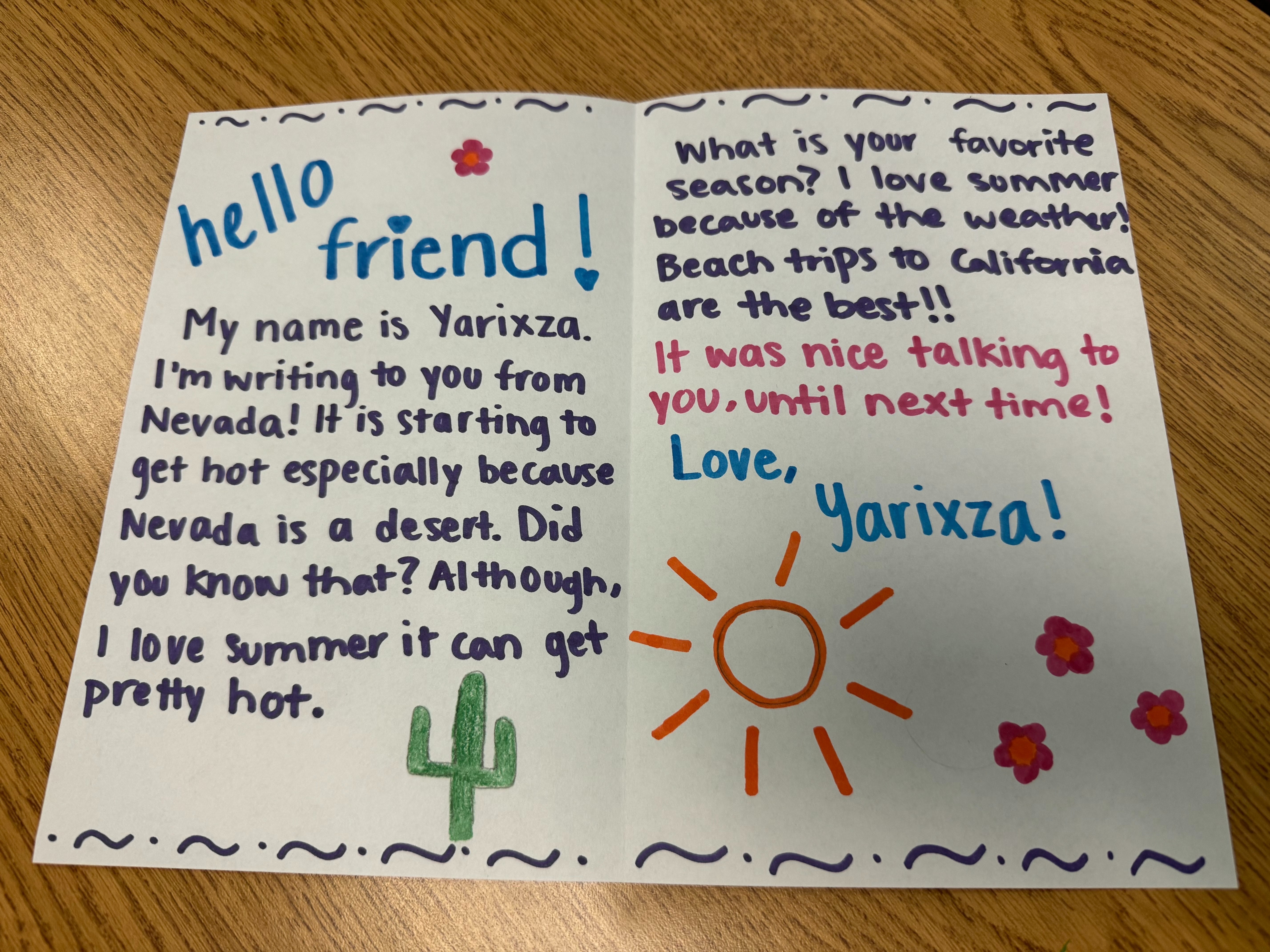 A handwritten letter from Yarixza in Nevada with colorful drawings and thoughtful questions.